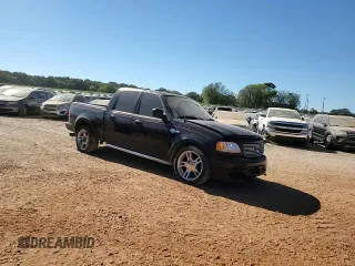 2002 Ford F-150 Harley Davidson with VIN 1FTRW07332KD46296, listed as a Copart auction lot 76333404 with 160,616 mi miles and Salvage Title. Bid and sale history available at carsss.com. Image 11.