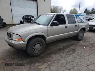 2001 GMC Sonoma SLS with VIN 1GTDT13W71K154628, listed as a Copart auction lot 50311424 with 186,383 mi miles and Salvage Title. Bid and sale history available at carsss.com. Image 1.