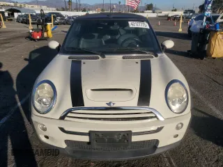 2007 MINI Convertible S with VIN WMWRH33567TL94957, listed as a Copart auction lot 42127775 with 90,401 mi miles and Salvage title. Bid and sale history available at DreamBid. Image 5.