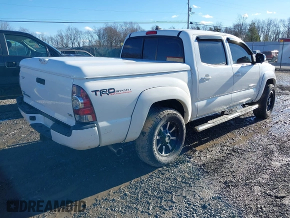 2015 Toyota Tacoma with VIN 3TMLU4EN8FM200529, listed as a IAAI auction lot 41602598 with 98,456 mi miles and . Bid and sale history available at DreamBid. Image 4.