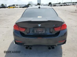 2020 BMW M4 with VIN WBS4Y9C02LFH16874, listed as a Copart auction lot 61334614 with 0 mi miles and Salvage Title. Bid and sale history available at carsss.com. Image 6.
