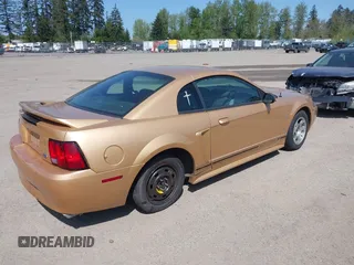 2000 Ford Mustang with VIN 1FAFP4041YF220522, listed as a IAAI auction lot 42090499 with 190,182 mi miles. Bid and sale history available at carsss.com. Image 4.