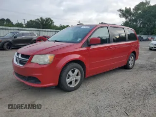 2012 Dodge Grand Caravan SXT with VIN 2C4RDGCG3CR236407, listed as a Copart auction lot 54771015 with 184,859 mi miles and Clean Title. Bid and sale history available at DreamBid. Image 1.