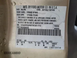 2000 Ford Focus LX with VIN 1FAFP33P8YW381773, listed as a Copart auction lot 80168174 with 151,410 mi miles and Salvage Title. Bid and sale history available at DreamBid. Image 13.