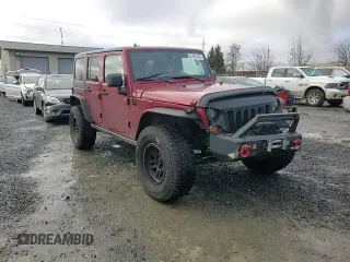 2012 Jeep Wrangler Unlimited Rubicon with VIN 1C4HJWFG2CL219021, listed as a Copart auction lot 87451784 with 109,675 mi miles and Salvage title. Bid and sale history available at DreamBid. Image 11.