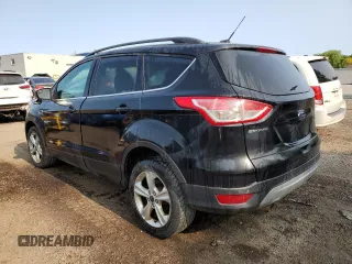 2014 Ford Escape SE with VIN 1FMCU9GX2EUB50177, listed as a Copart auction lot 58579645 with 228,017 mi miles and Salvage title. Bid and sale history available at DreamBid. Image 2.