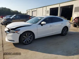 2019 Mazda 6 Grand Touring with VIN JM1GL1TY4K1507123, listed as a Copart auction lot 74100054 with 63,809 mi miles and Salvage Title. Bid and sale history available at carsss.com. Image 1.