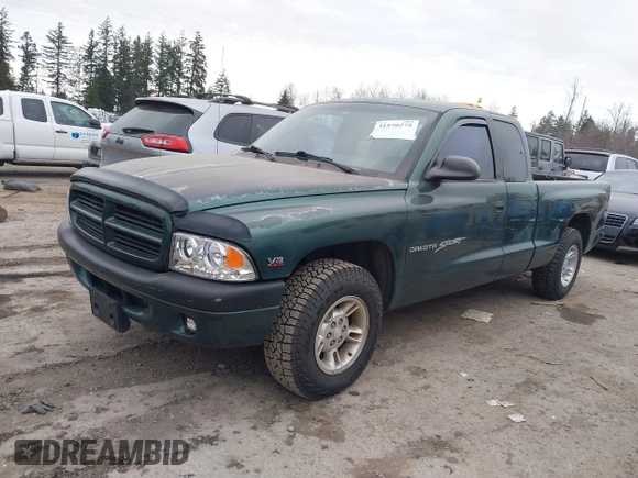 2000 Dodge Dakota Sport with VIN 1B7GL22N6YS764185, listed as a IAAI auction lot 41570275 with 157,334 mi miles. Bid and sale history available at carsss.com. Image 2.