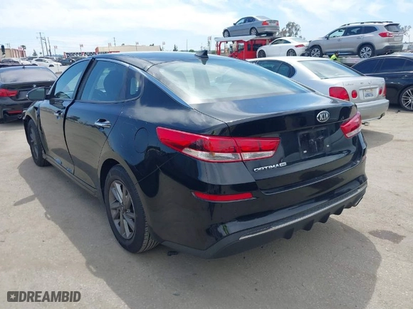 2019 Kia Optima S with VIN 5XXGT4L34KG296953, listed as a IAAI auction lot 42014999 with 64,968 mi miles. Bid and sale history available at carsss.com. Image 3.