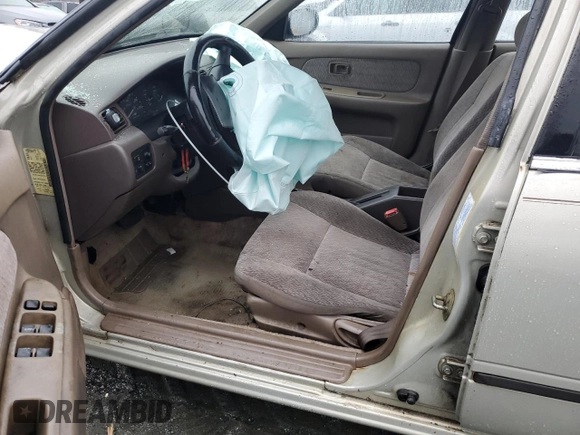 1998 Nissan Sentra XE with VIN 3N1AB41D5WL045702, listed as a Copart auction lot 45149225 with 205,521 mi miles and Salvage title. Bid and sale history available at DreamBid. Image 7.