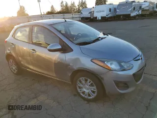 2014 Mazda 2 Sport with VIN JM1DE1KZ6E0184808, listed as a Copart auction lot 83399384 with 96,866 mi miles and Salvage Title. Bid and sale history available at carsss.com. Image 4.