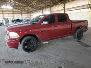 2012 Ram 1500 Tradesman with VIN 1C6RD6KP2CS296003, listed as a Copart auction lot 82170314 with 136,216 mi miles and Salvage title. Bid and sale history available at DreamBid. Image 1.