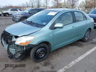 2009 Toyota Yaris with VIN JTDBT903794060474, listed as a IAAI auction lot 42005903 with 104,607 mi miles. Bid and sale history available at carsss.com. Image 17.