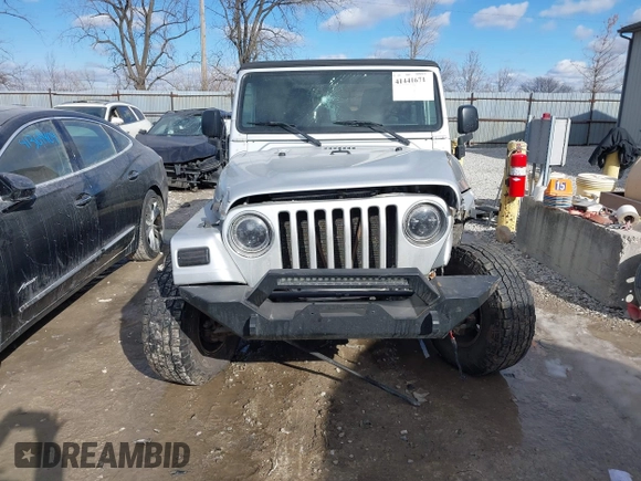2005 Jeep Wrangler Unlimited with VIN 1J4FA44S25P340852, listed as a IAAI auction lot 41441671 with 139,302 mi miles. Bid and sale history available at carsss.com. Image 12.