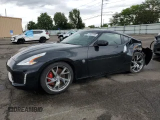 2014 Nissan 370Z Nismo z VIN JN1AZ4EH7EM636031, wystawiony jako Copart lot #57637805 z przebiegiem 61 352 mil mil oraz Szkoda całkowita • Salvage title. Historia ofert i sprzedaży dostępna na DreamBid. Obrazek 1.