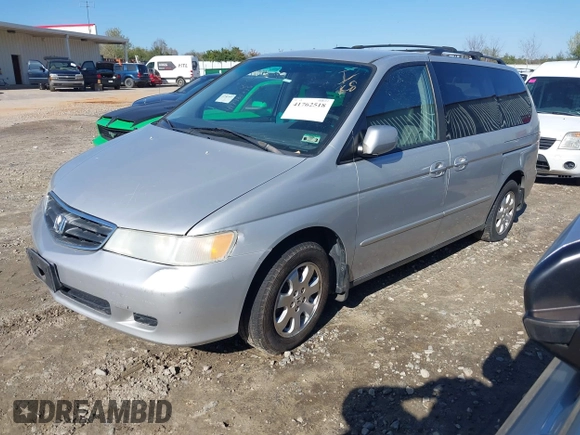 2004 Honda Odyssey EX-L with VIN 5FNRL18974B057715, listed as a IAAI auction lot 41762518 with 193,626 mi miles and . Bid and sale history available at DreamBid. Image 2.