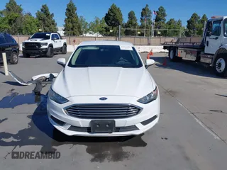 2018 Ford Fusion S z VIN 3FA6P0UU5JR122606, wystawiony jako IAAI lot #42239394 z przebiegiem 88 148 mil mil oraz . Historia ofert i sprzedaży dostępna na DreamBid. Obrazek 13.