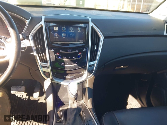 2015 Cadillac SRX with VIN 3GYFNAE35FS608595, listed as a IAAI auction lot 41282751 with 127,055 mi miles and . Bid and sale history available at DreamBid. Image 22.