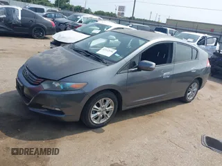 2010 Honda Insight EX with VIN JHMZE2H71AS043465, listed as a IAAI auction lot 42312556 with 151,009 mi miles and . Bid and sale history available at DreamBid. Image 17.