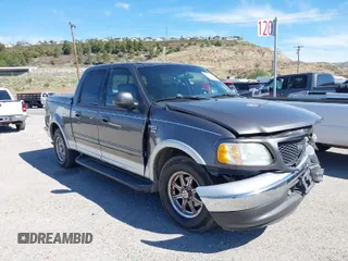 2002 Ford F-150 with VIN 1FCRW07L12KA23459, listed as a IAAI auction lot 41836394 with 238,202 mi miles and . Bid and sale history available at DreamBid. Image 1.
