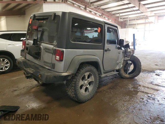 2016 Jeep Wrangler Sahara with VIN 1C4AJWBG2GL307824, listed as a Copart auction lot 49161635 with Not provided miles and Clean title. Bid and sale history available at DreamBid. Image 3.