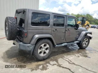 2016 Jeep Wrangler Unlimited Sahara с VIN 1C4BJWEG5GL221827, выставлен на аукционе Copart как лот 60411625 с пробегом 65 405 миль миль и Списание • Salvage title. История ставок и продаж доступна на DreamBid. Изображение 3.