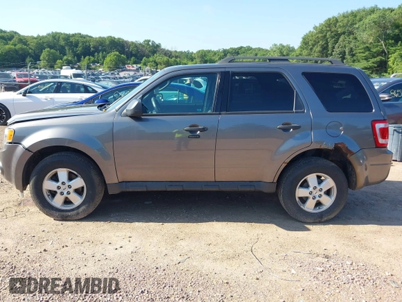 2012 Ford Escape XLT z VIN 1FMCU9DG7CKB28270, wystawiony jako IAAI lot #42607520 z przebiegiem 129 758 mil mil oraz . Historia ofert i sprzedaży dostępna na DreamBid. Obrazek 14.