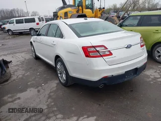 2015 Ford Taurus Limited with VIN 1FAHP2F85FG117635, listed as a IAAI auction lot 41979311 with 104,314 mi miles. Bid and sale history available at carsss.com. Image 3.