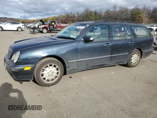 2001 Mercedes-Benz E-Class AWD with VIN WDBJH82J81X052002, listed as a Copart auction lot 82832724 with 187,464 mi miles and Salvage Title. Bid and sale history available at carsss.com. Image 1.