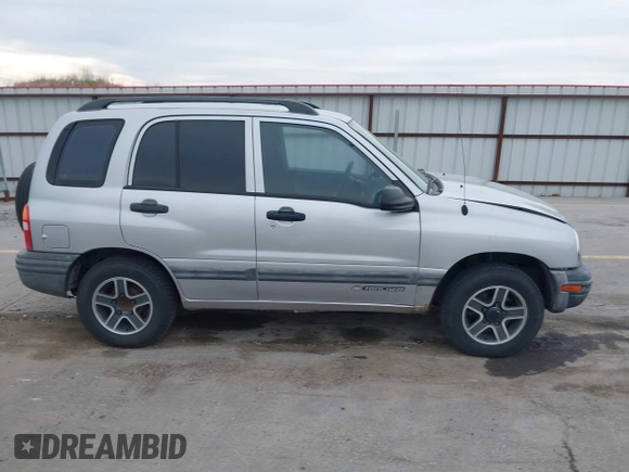 2003 Chevrolet Tracker z VIN 2CNBE134736919970, wystawiony jako IAAI lot #42203446 z przebiegiem 158 872 mil mil oraz . Historia ofert i sprzedaży dostępna na DreamBid. Obrazek 13.