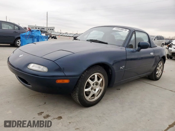 1994 Mazda MX-5 Miata with VIN JM1NA3537R0512679, listed as a Copart auction lot 45649075 with 126,476 mi miles and Salvage title. Bid and sale history available at DreamBid. Image 1.
