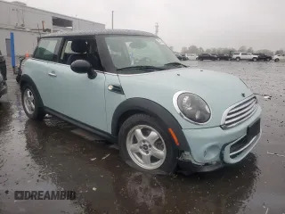 2011 MINI Hardtop with VIN WMWSU3C57BT096973, listed as a Copart auction lot 52726185 with 90,545 mi miles and Salvage title. Bid and sale history available at DreamBid. Image 4.