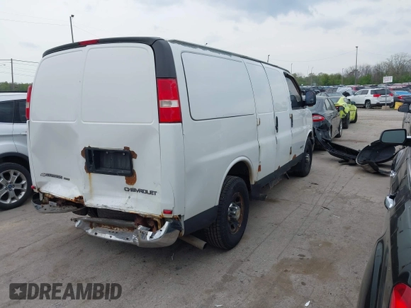 2003 Chevrolet Express Cargo with VIN 1GCGG25V031175986, listed as a IAAI auction lot 42144402 with 353,661 mi miles and . Bid and sale history available at DreamBid. Image 4.