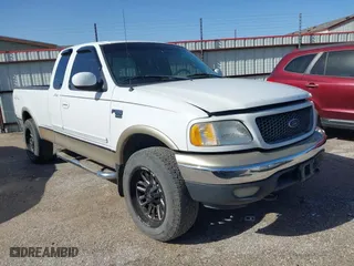 2000 Ford F-150 XL with VIN 1FTRX18W6YNA72319, listed as a IAAI auction lot 41682748 with 265,559 mi miles. Bid and sale history available at carsss.com. Image 1.