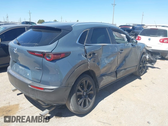 2024 Mazda CX-30 S Preferred with VIN 3MVDMBCM5RM606886, listed as a IAAI auction lot 41867949 with 15,410 mi miles and . Bid and sale history available at DreamBid. Image 4.