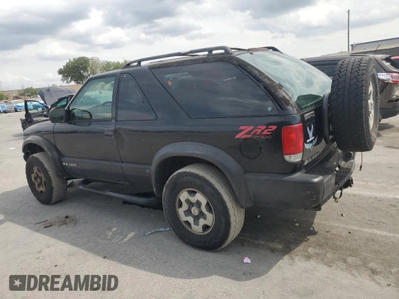 1999 Chevrolet Blazer LS with VIN 1GNCT18W6XK224253, listed as a Copart auction lot 50708405 with 209,711 mi miles and Salvage title. Bid and sale history available at DreamBid. Image 2.