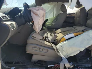 2014 Honda Odyssey Touring с VIN 5FNRL5H90EB082822, выставлен на аукционе Copart как лот 53528555 с пробегом Не указан миль и Списание • Salvage title. История ставок и продаж доступна на DreamBid. Изображение 7.