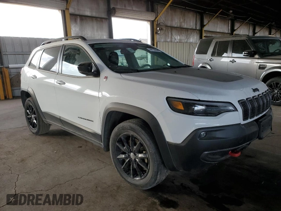 2022 Jeep Cherokee Trailhawk with VIN 1C4PJMBX6ND556259, listed as a Copart auction lot 44730605 with 55,328 mi miles and Non Repairable. Bid and sale history available at carsss.com. Image 4.