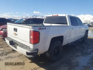 2018 Chevrolet Silverado 1500 LT with VIN 1GCUKRECXJF198247, listed as a Copart auction lot 49496595 with 81,408 mi miles and Salvage Title. Bid and sale history available at DreamBid. Image 3.