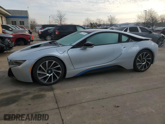 2015 BMW i8 z VIN WBY2Z2C56FV674231, wystawiony jako Copart lot #37218014 z przebiegiem 27 465 mil mil oraz . Historia ofert i sprzedaży dostępna na DreamBid. Obrazek 1.