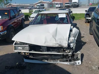 1990 Oldsmobile Delta z VIN 1G3HN54C1L1808457, wystawiony jako IAAI lot #41978123 z przebiegiem 146 383 mil mil oraz . Historia ofert i sprzedaży dostępna na DreamBid. Obrazek 11.