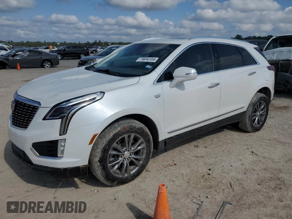 2021 Cadillac XT5 FWD Premium Luxury z VIN 1GYKNCR48MZ136597, wystawiony jako Copart lot #79694104 z przebiegiem 52 504 mil mil oraz Szkoda całkowita • Salvage title. Historia ofert i sprzedaży dostępna na DreamBid. Obrazek 1.
