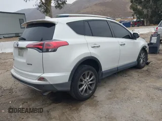 2016 Toyota RAV4 Limited with VIN JTMYFREV2GJ065656, listed as a IAAI auction lot 42575320 with 124,648 mi miles and . Bid and sale history available at DreamBid. Image 4.