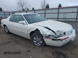 1998 Cadillac Eldorado z VIN 1G6EL12Y2WU603722, wystawiony jako IAAI lot #41879733 z przebiegiem 81 780 mil mil oraz . Historia ofert i sprzedaży dostępna na DreamBid. Obrazek 1.