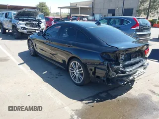 2015 BMW 4 Series 428i z VIN WBA4A9C52FGL86332, wystawiony jako IAAI lot #41970189 z przebiegiem 112 282 mil mil oraz . Historia ofert i sprzedaży dostępna na DreamBid. Obrazek 3.