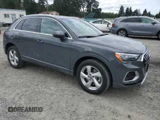 2020 Audi Q3 Premium with VIN WA1AECF31L1002342, listed as a Copart auction lot 60729665 with 29,154 mi miles and Salvage title. Bid and sale history available at DreamBid. Image 4.