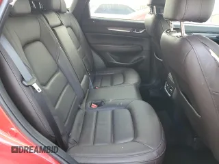 2023 Mazda CX-5 Signature with VIN JM3KFBXY4P0100652, listed as a Copart auction lot 82235664 with 29,344 mi miles and Salvage Title. Bid and sale history available at carsss.com. Image 12.
