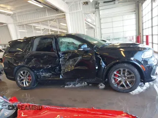 2021 Dodge Durango R/T with VIN 1C4SDJCT1MC788493, listed as a IAAI auction lot 41213673 with 80,287 mi miles and . Bid and sale history available at DreamBid. Image 13.
