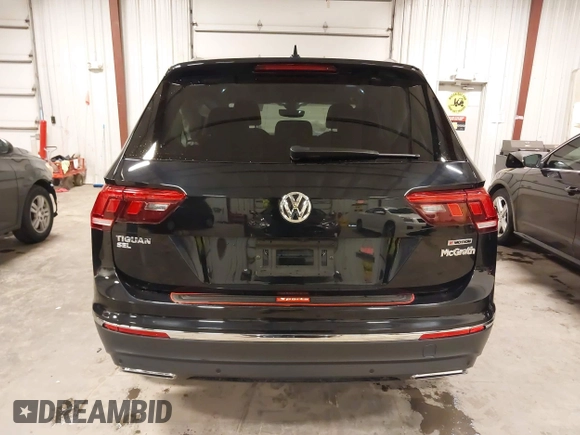 2021 Volkswagen Tiguan SE with VIN 3VV2B7AXXMM034880, listed as a IAAI auction lot 41979636 with 34,490 mi miles and . Bid and sale history available at DreamBid. Image 17.