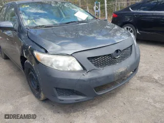 2010 Toyota Corolla with VIN 2T1BU4EE0AC521946, listed as a IAAI auction lot 42049301 with 169,807 mi miles. Bid and sale history available at carsss.com. Image 6.
